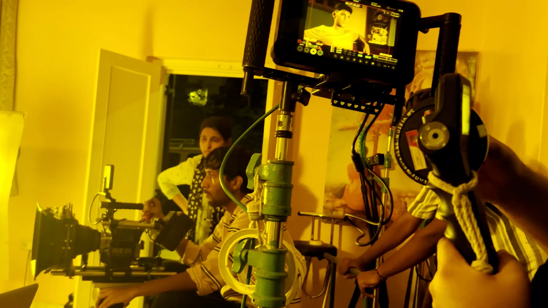 Students learning filmmaking with a Red camera at MDFA