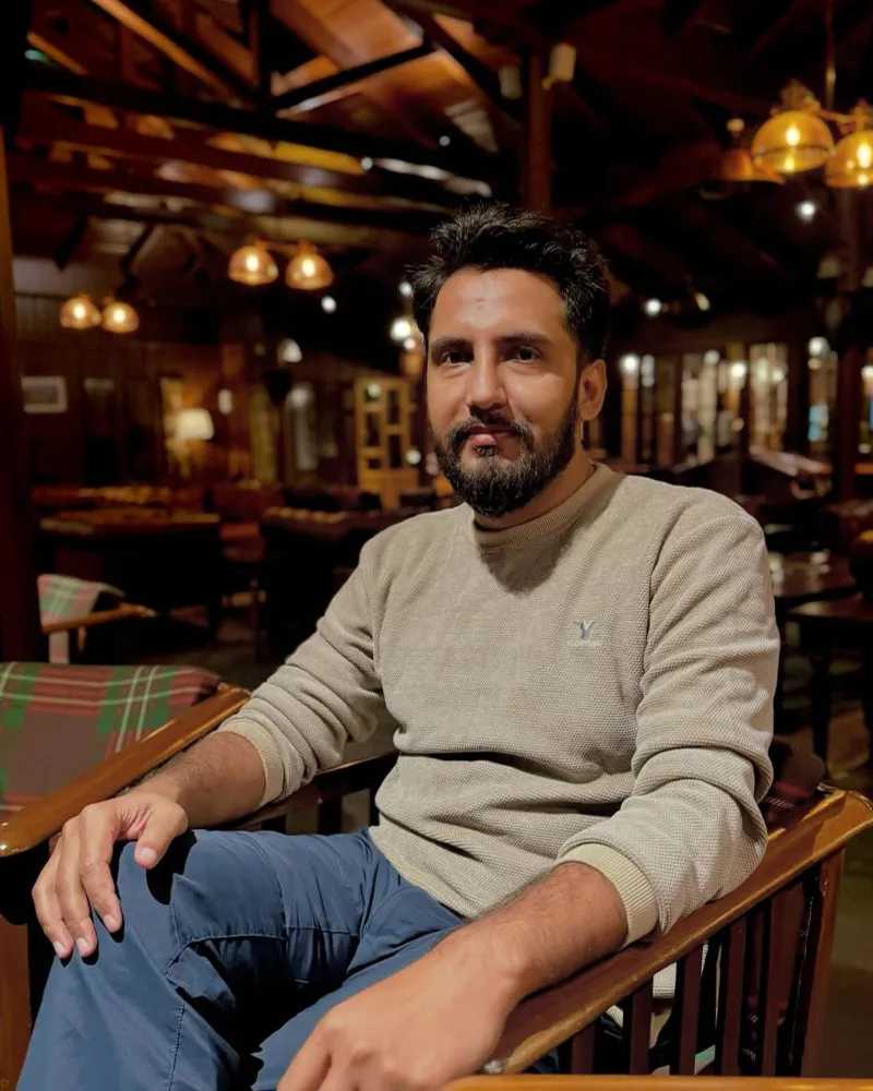 Pramod, MDFA alumni and film director working on a film set