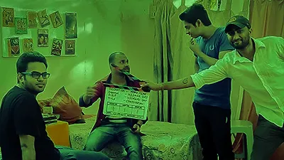 Student directing a film scene on set