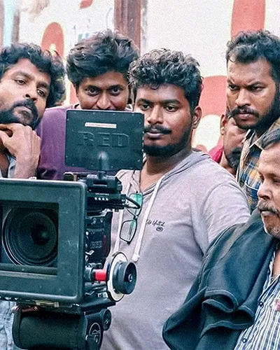 Nandhakumar M framing a shot with Red Komodo 6K camera on professional film set