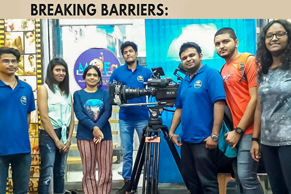 Group of women filmmakers working on movie set